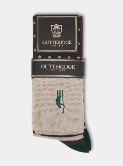 Calza lunga a pois e righe con ricamo