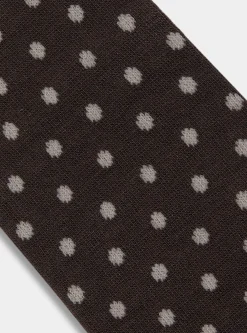 Calza lunga a pois e righe con ricamo