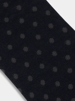 Calza lunga a pois e righe con ricamo