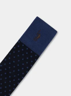 Calza lunga a pois e righe con ricamo
