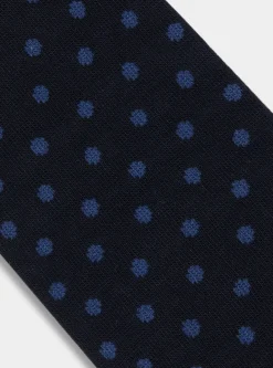 Calza lunga a pois e righe con ricamo
