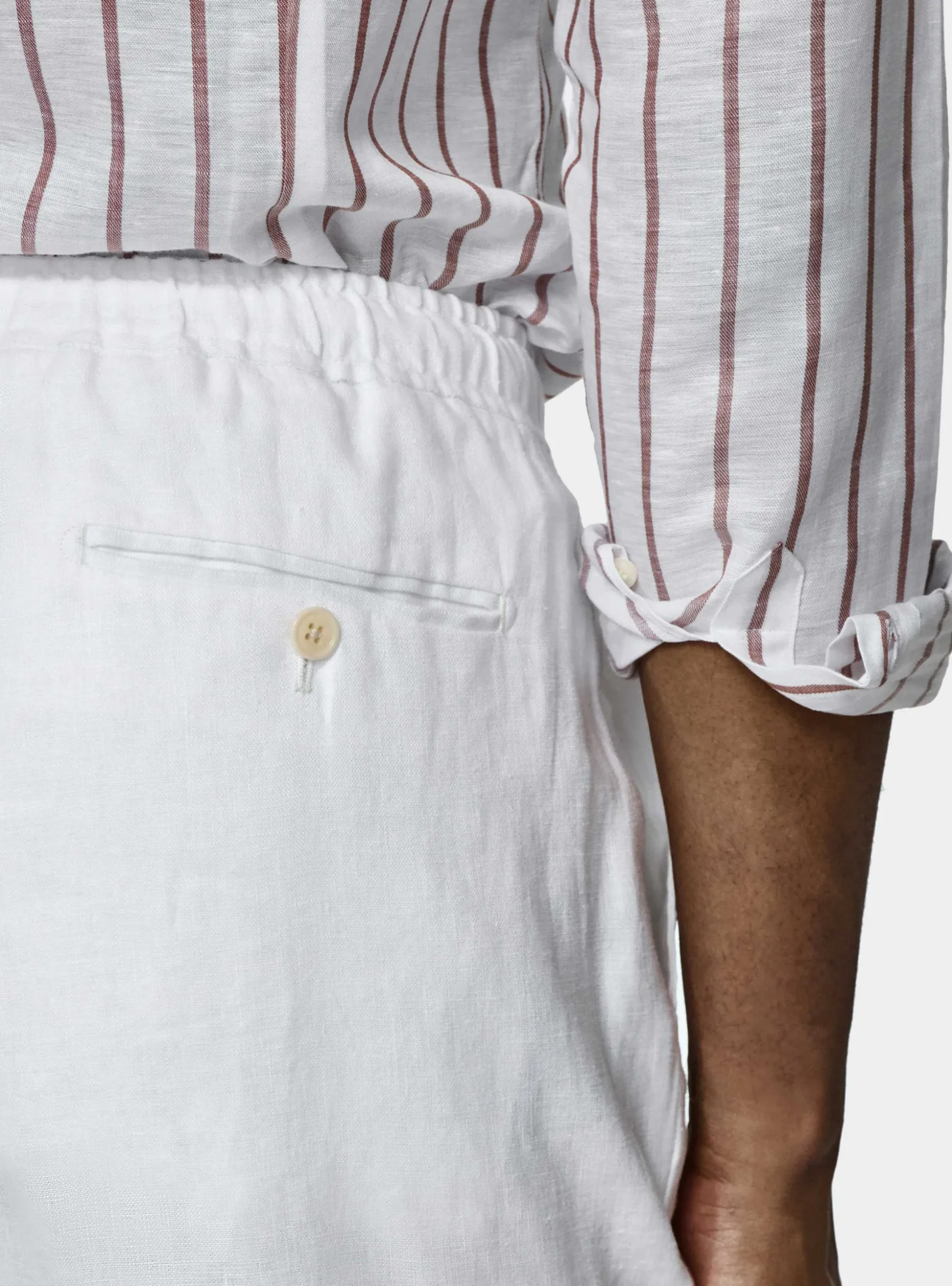 Pantaloni in puro lino con pince e coulisse