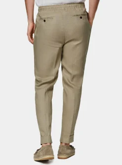 Pantaloni in puro lino con pince e coulisse