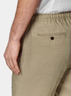 Pantaloni in puro lino con pince e coulisse