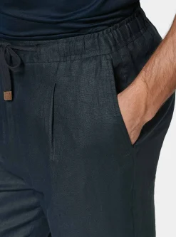 Pantaloni in puro lino con pince e coulisse