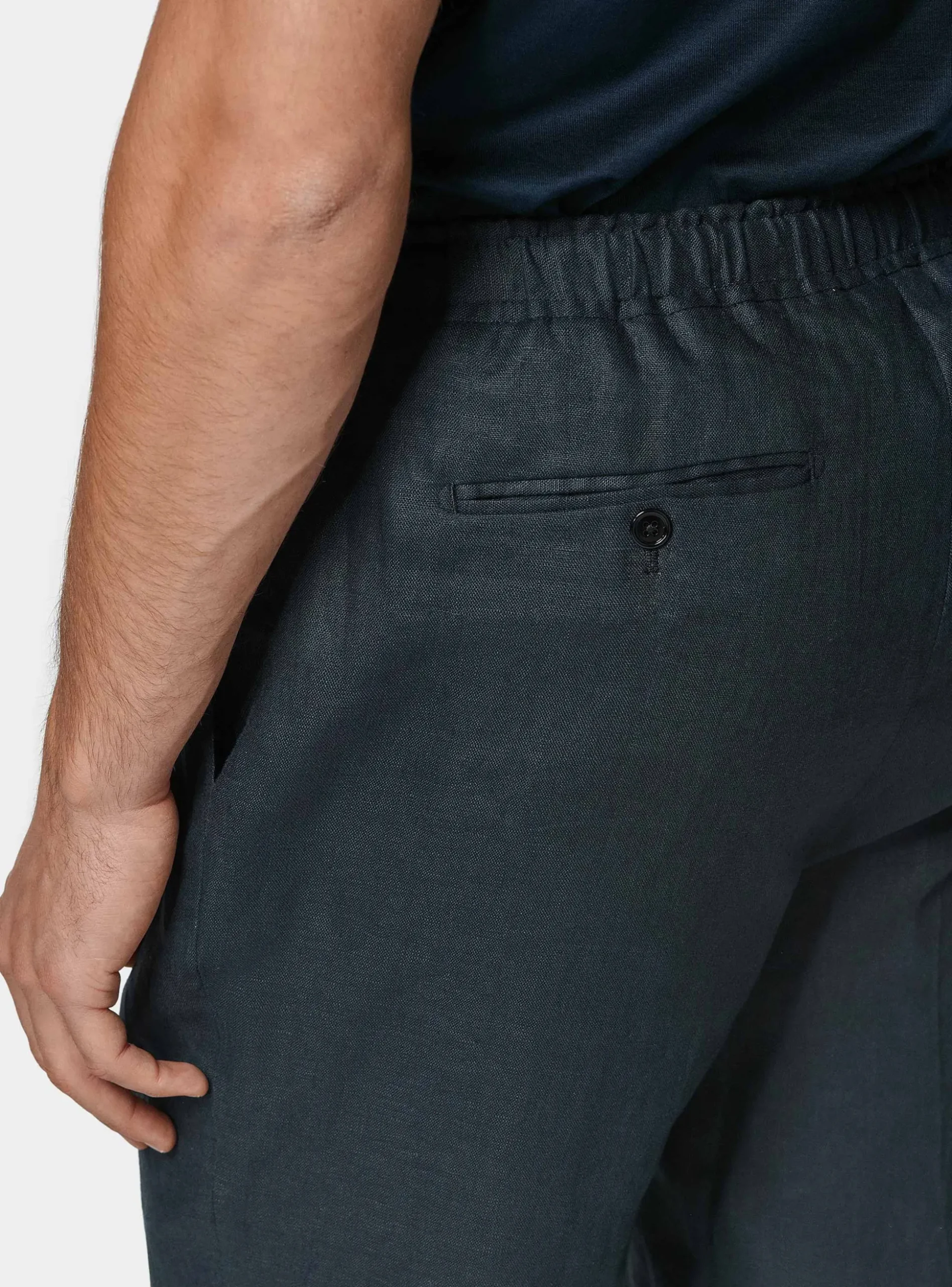 Pantaloni in puro lino con pince e coulisse